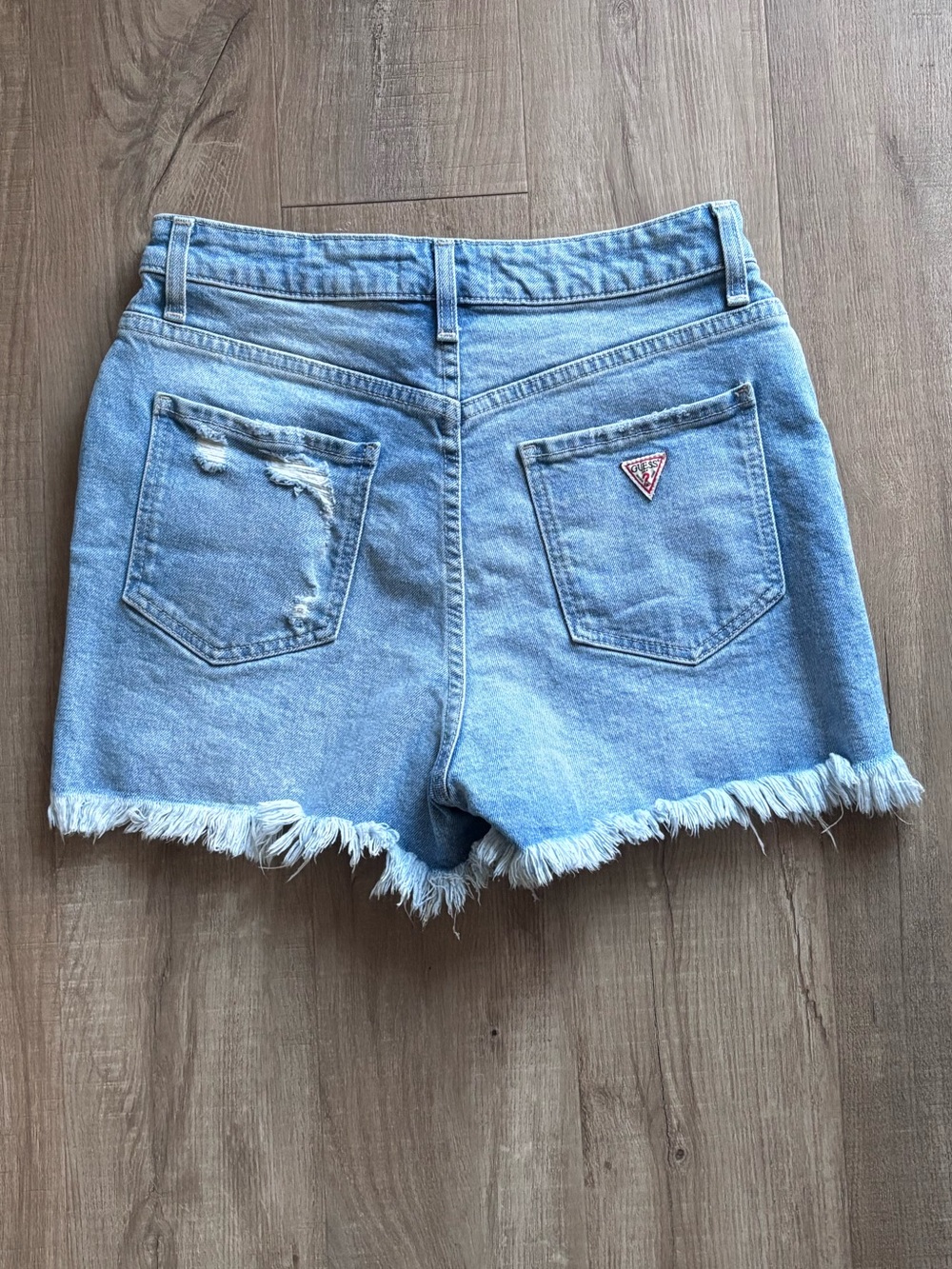 GUESS High Waist Denim Distressed Shorts in Blue